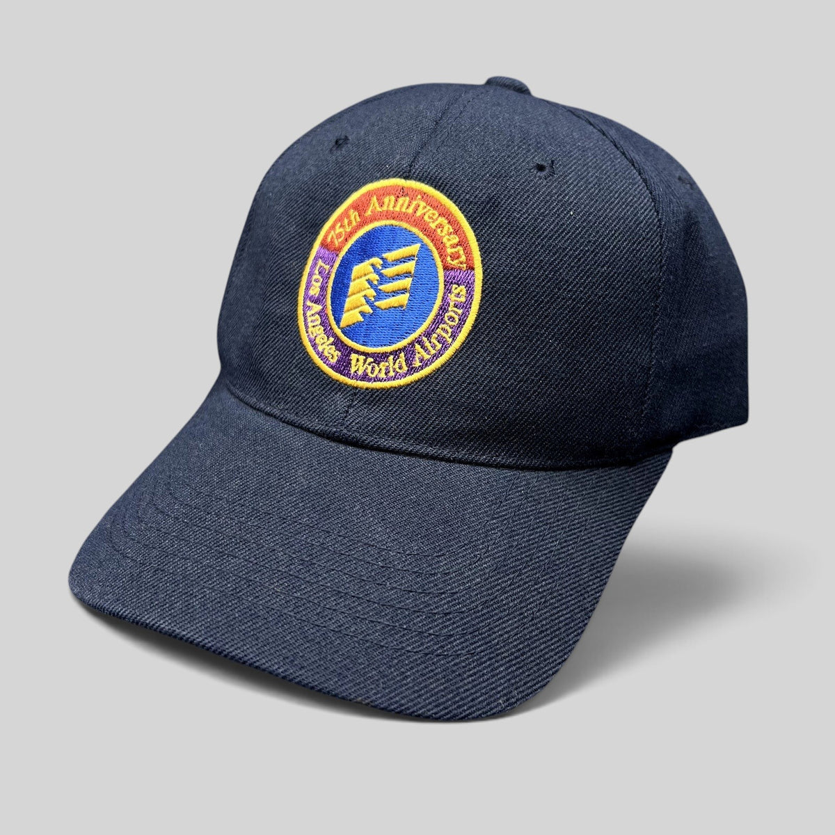 Raree Finds navy blue wool-blend strapback hat featuring a 75th Anniversary Los Angeles World Airports embroidered logo