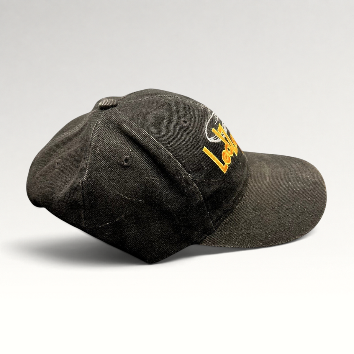 Raree Finds black cotton Led Zeppelin strapback hat with embroidered yellow logo and airship graphic, side view.