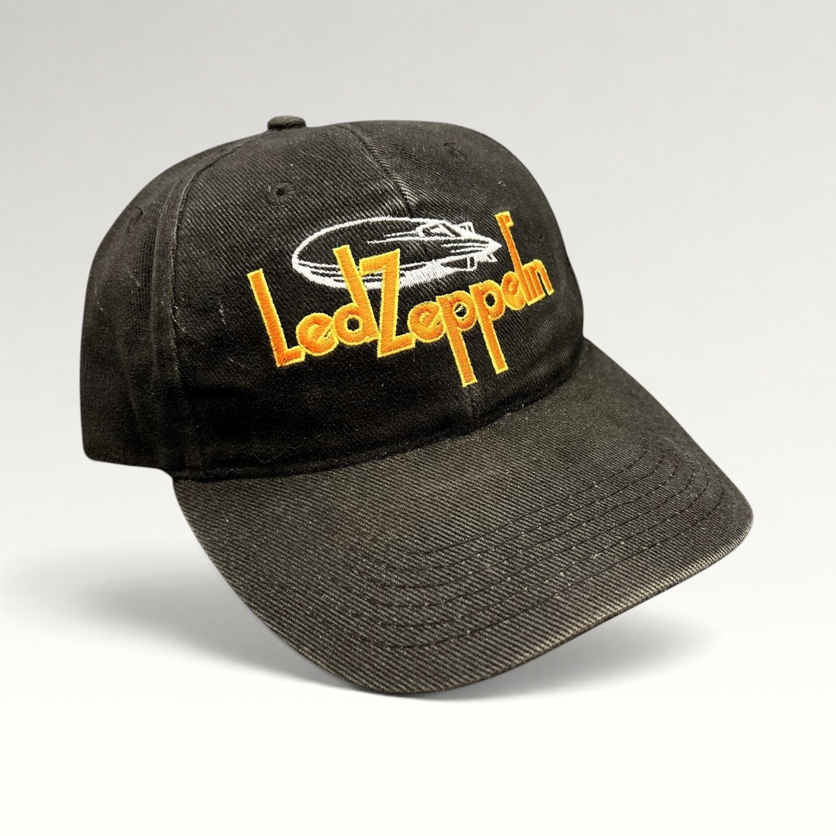 Raree Finds black cotton Led Zeppelin strapback hat with embroidered yellow logo and airship graphic