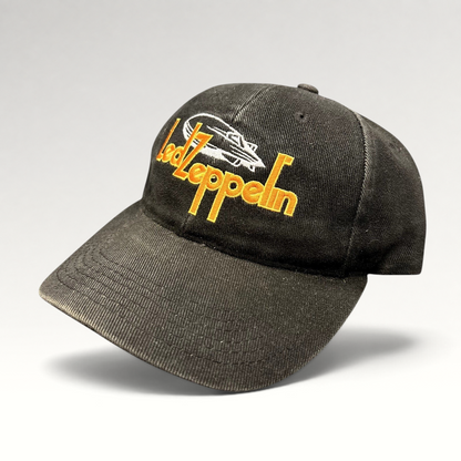 Raree Finds black cotton strapback hat featuring an embroidered yellow Led Zeppelin logo and white airship graphic.