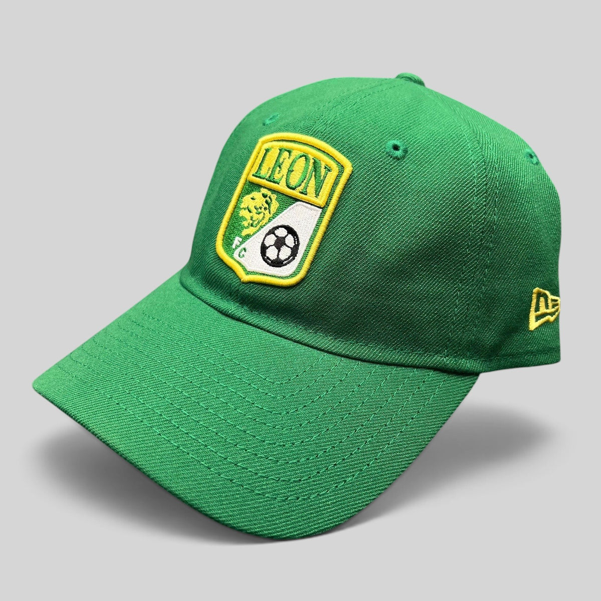 Raree Finds green LEON FC soccer crest hat with embroidered lion logo and New Era 9TWENTY unstructured strapback design