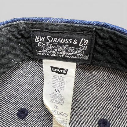 Raree Finds Levi Strauss & Co denim cap interior showing woven brand label and 100% cotton care tag