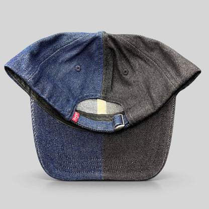 Raree Finds Levi’s two-tone split denim strapback hat in black and indigo cotton with a metal slider closure