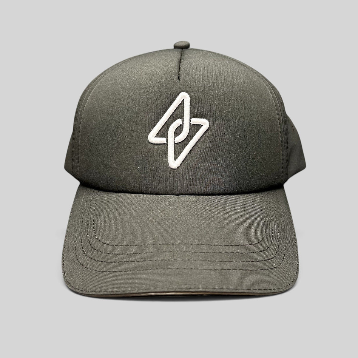 Raree Finds LGCY black performance strapback hat with a tonal raised embroidered logo and curved brim