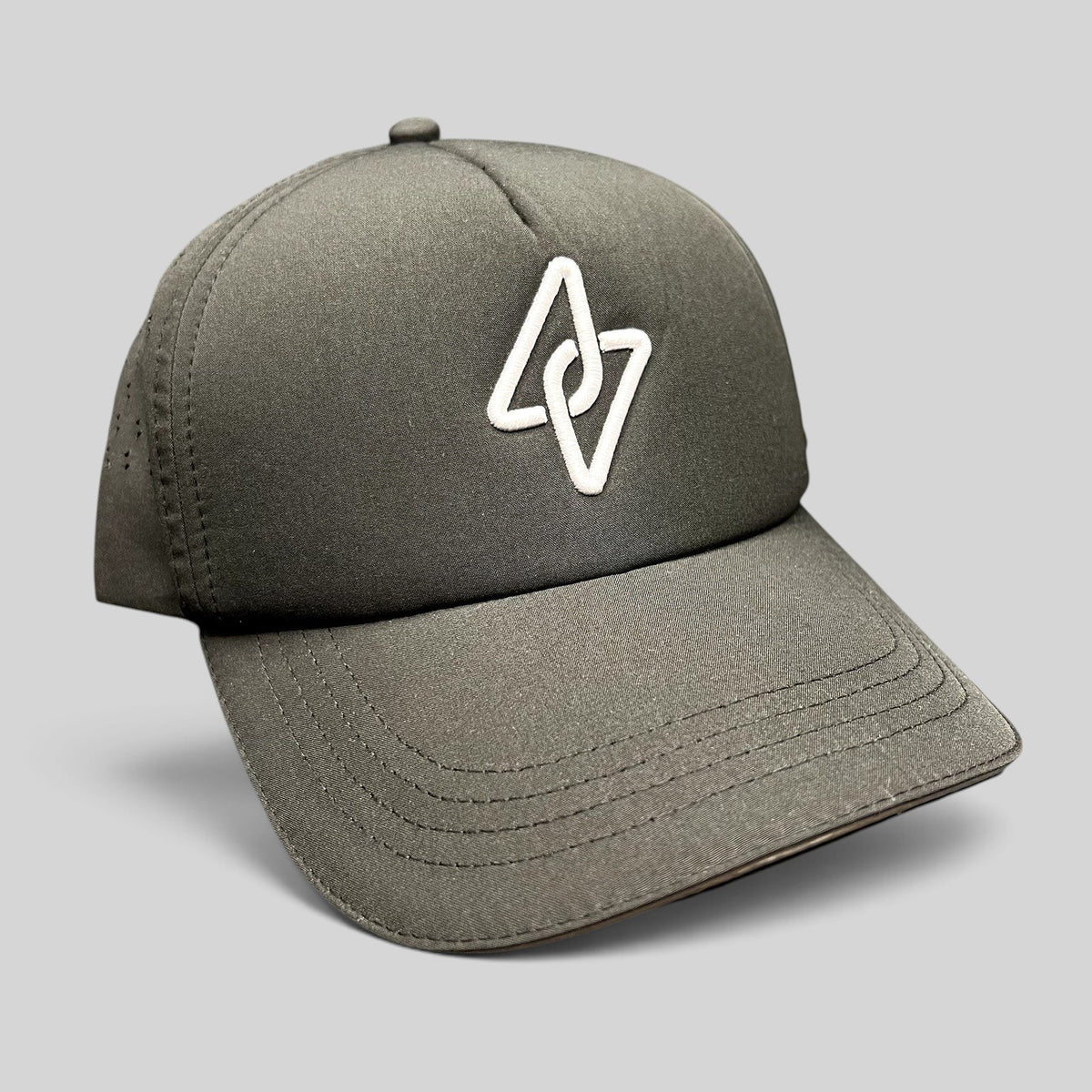 Raree Finds LGCY black performance strapback hat with a raised white embroidered logo and laser-perforated side panels.