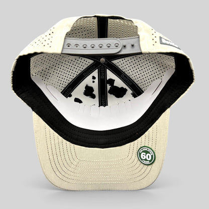 Raree Finds LH Dottie Company tan snapback hat interior view showing perforated panels and branded inner tape