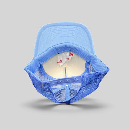 Raree Finds light-blue trucker hat with mesh back, snapback closure, and interior LA logo with red heart embroidery.