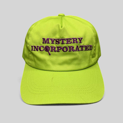 Raree Finds Scooby-Doo Mystery Incorporated snapback hat in lime green with purple embroidered lettering.