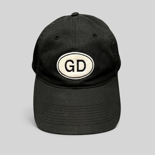 Raree Finds black cotton strapback hat by Liquid Blue featuring a white oval GD logo patch on the front