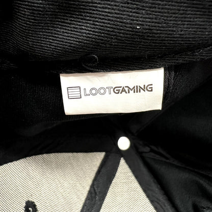 Raree Finds Loot Gaming branded tag inside a black and red LawBreakers snapback hat