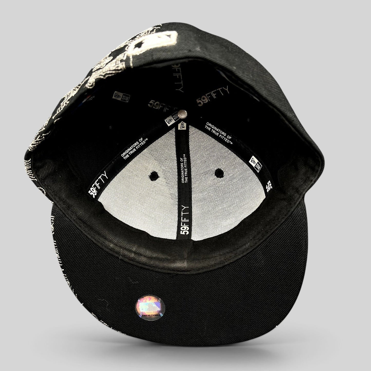 Raree Finds black New Era 59FIFTY Los Angeles Angels fitted cap interior showing branded taping and flat brim