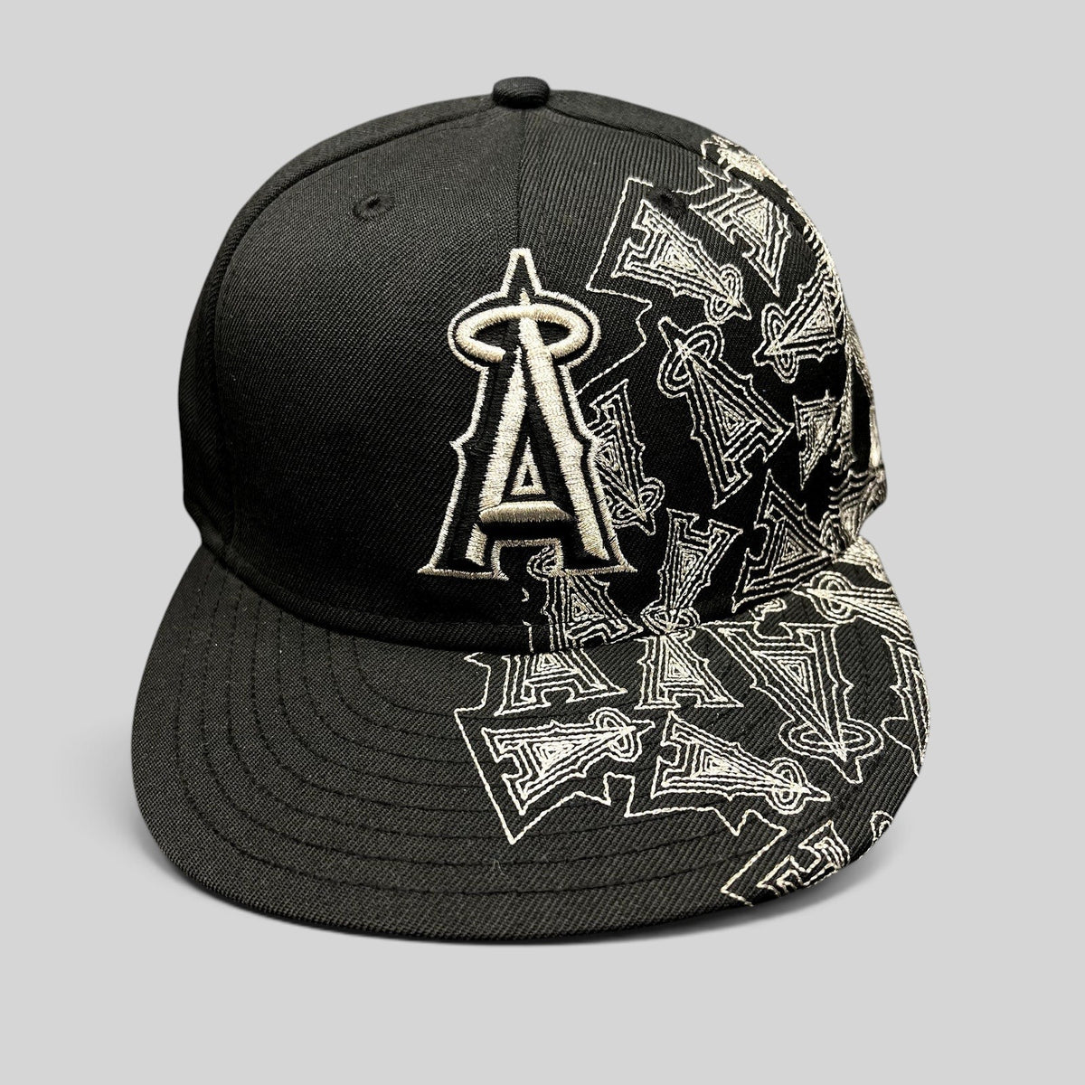 Raree Finds black New Era 59FIFTY Los Angeles Angels fitted hat with silver embroidered logo and side pattern
