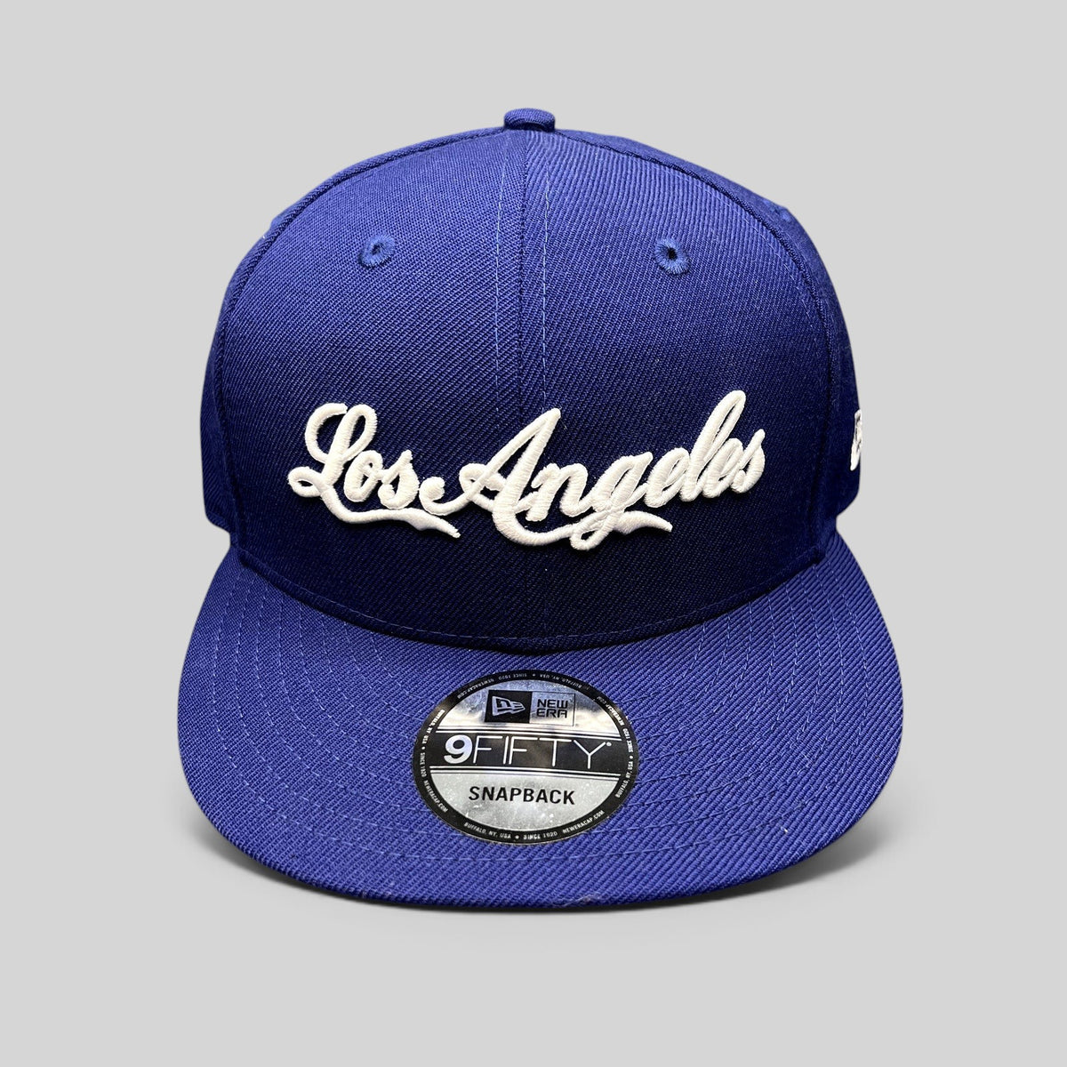 Raree Finds Los Angeles Dodgers royal blue 9FIFTY snapback hat with white raised script embroidery and flat visor