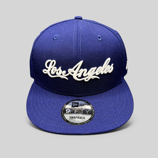 Raree Finds Los Angeles Dodgers royal blue 9FIFTY snapback hat with white raised script embroidery and flat visor