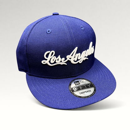 Raree Finds Los Angeles Dodgers royal blue 9FIFTY snapback hat with white raised script embroidery and flat visor