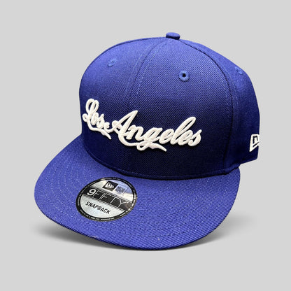 Raree Finds Los Angeles Dodgers royal blue 9FIFTY snapback hat with white raised script embroidery and flat visor