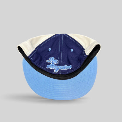 Raree Finds New Era 59FIFTY fitted hat with light blue brim and Los Angeles script embroidery on the underbrim