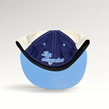 Raree Finds New Era 59FIFTY fitted hat with light blue brim and Los Angeles script embroidery on the underbrim