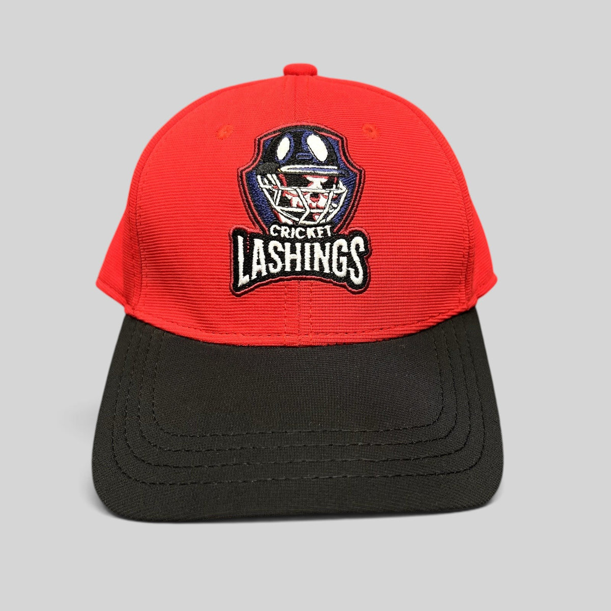Raree Finds Los Angeles Lashings cricket team fitted cap with a red crown, black visor, and embroidered team crest.