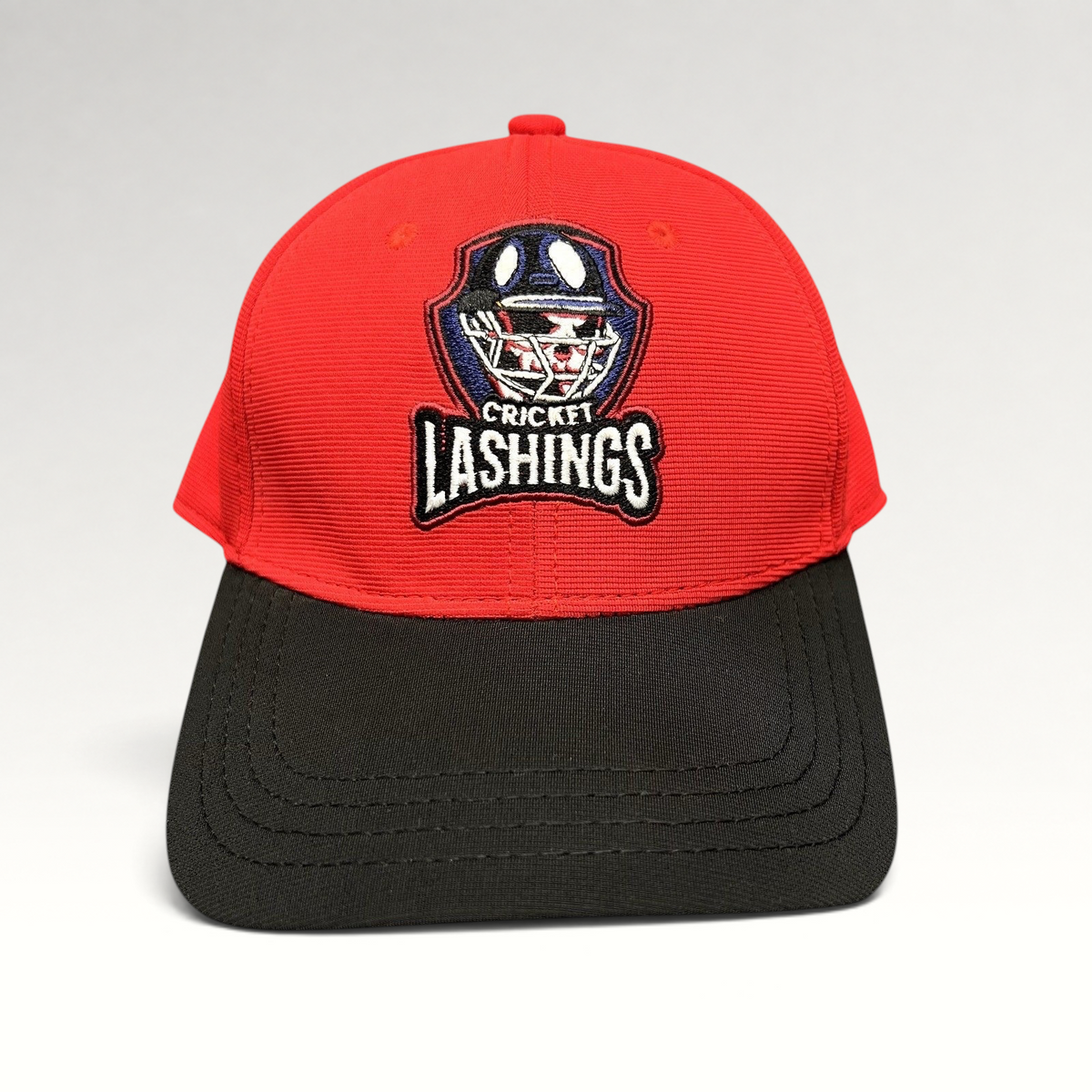 Raree Finds Los Angeles Lashings cricket team fitted cap with a red crown, black visor, and embroidered team crest.