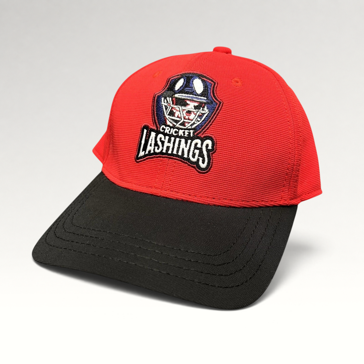 Raree Finds Los Angeles Lashings cricket fitted cap with a red crown, black visor, and embroidered team crest.