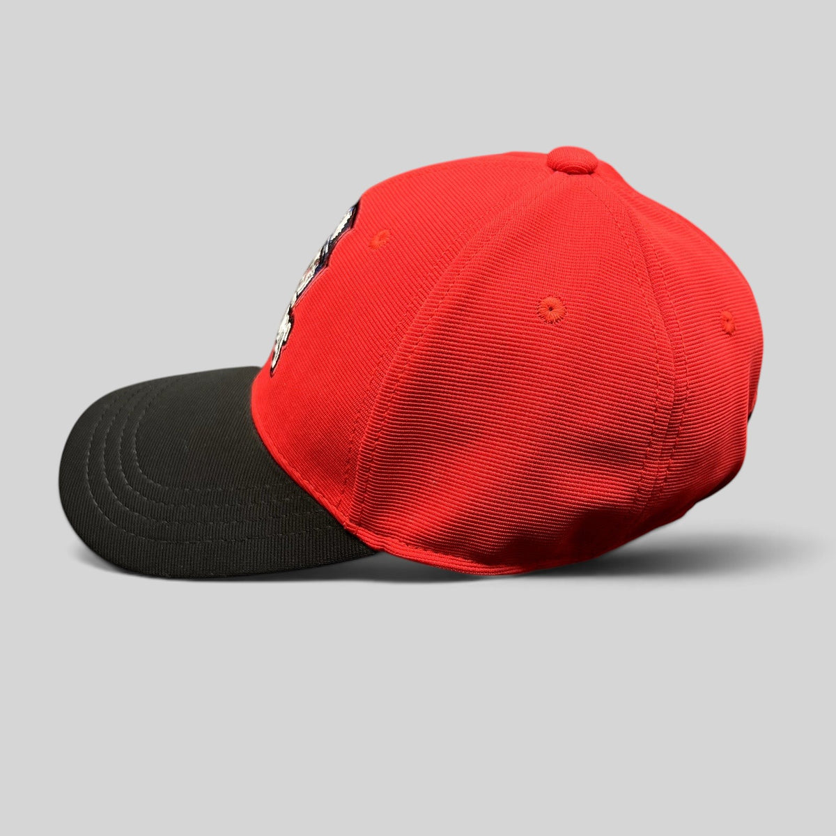 Raree Finds Los Angeles Lashings cricket team fitted cap with a red crown, black visor, and embroidered team crest.