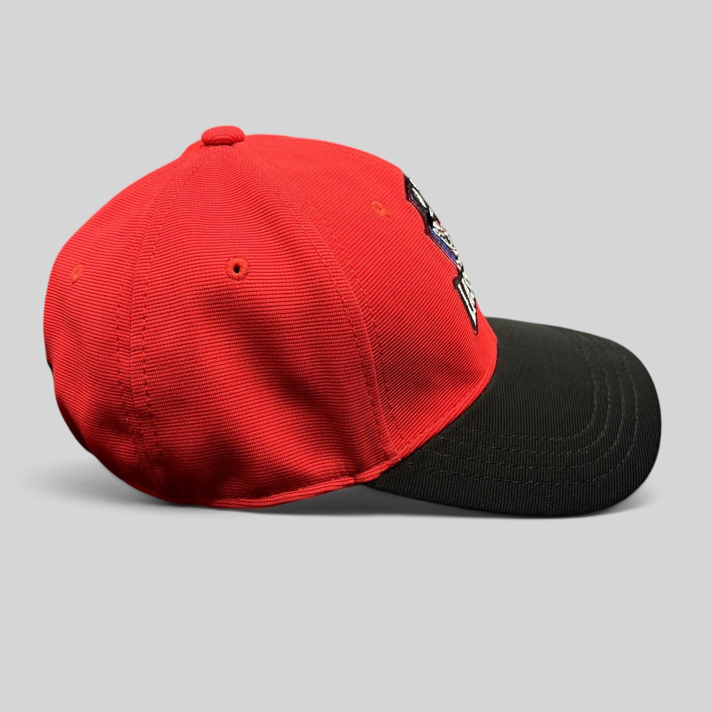 Raree Finds Los Angeles Lashings cricket team fitted cap with a red crown, black visor, and embroidered team crest.