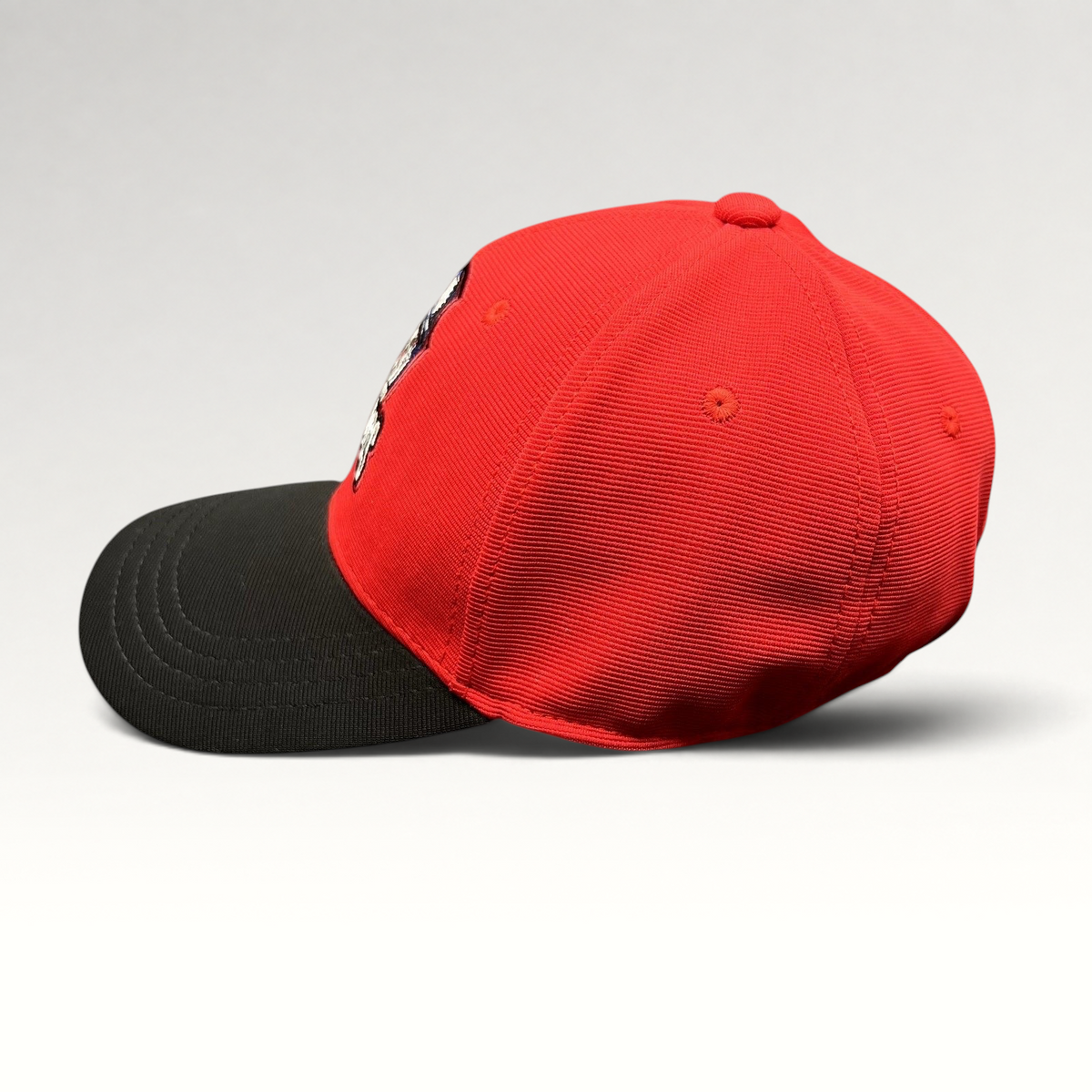 Raree Finds Los Angeles Lashings cricket team fitted cap with a red crown, black visor, and embroidered team crest.
