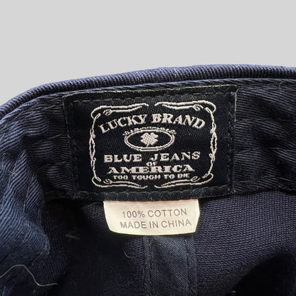 Raree Finds Lucky Brand navy cotton twill snapback cap interior label with vintage logo embroidery