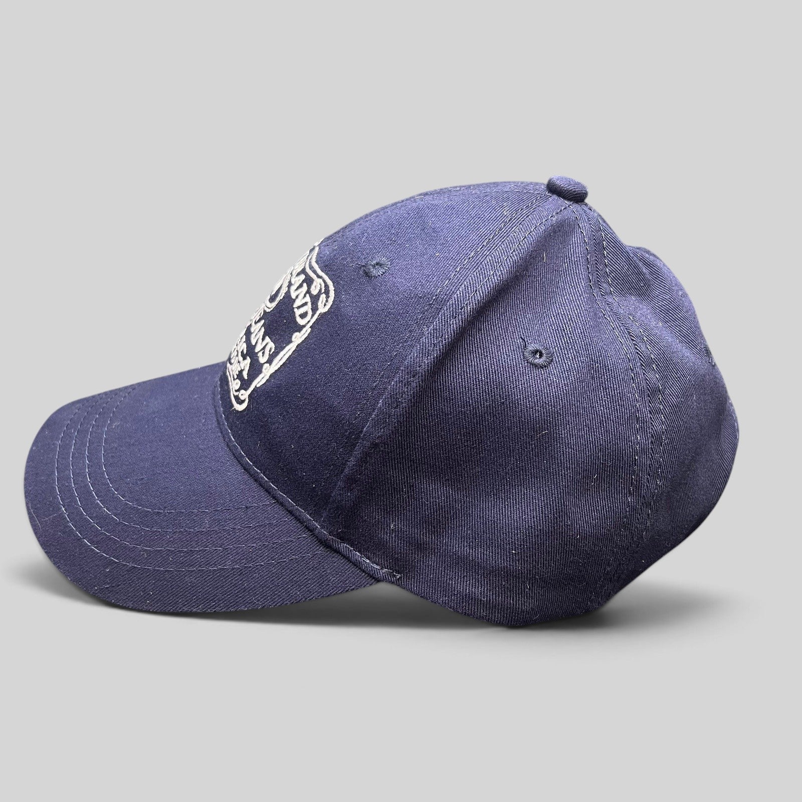Raree Finds Lucky Brand navy cotton twill snapback hat with white embroidered vintage logo on the front