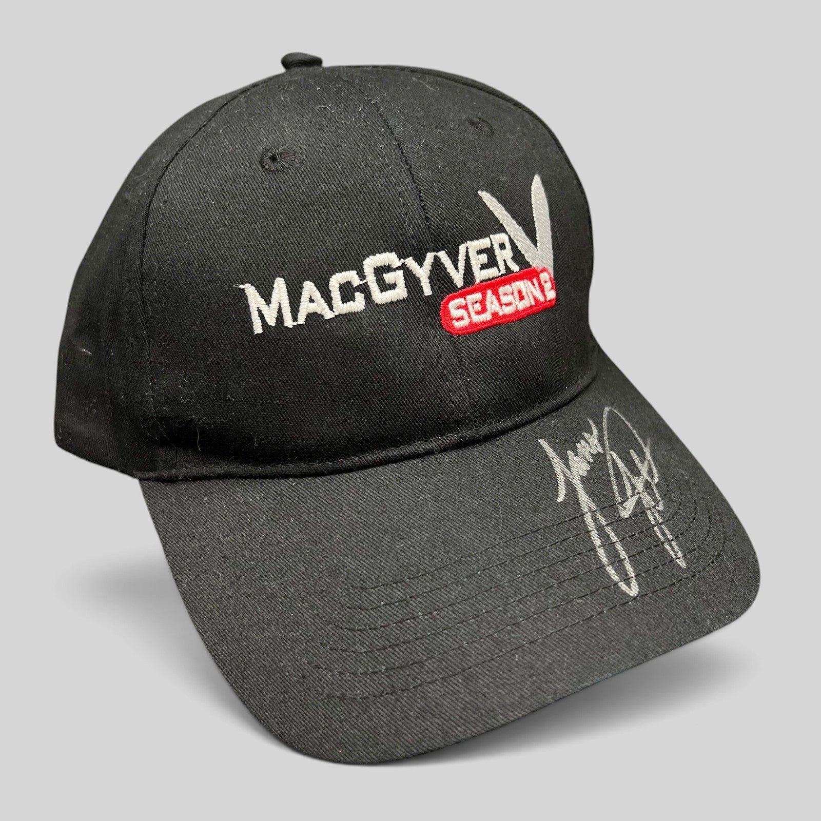 Raree Finds vintage black MacGyver Season 2 promo hat with embroidered logo and hand-signed brim