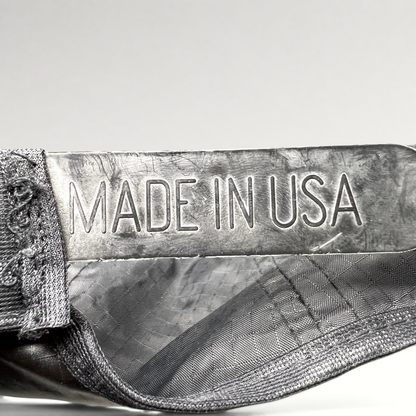 Raree Finds vintage snapback hat interior label showing Made in USA text on black ripstop nylon fabric