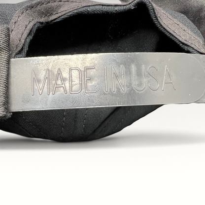 Raree Finds vintage Competition Headwear snapback hat showing the Made in USA stamp on the plastic adjustable strap.