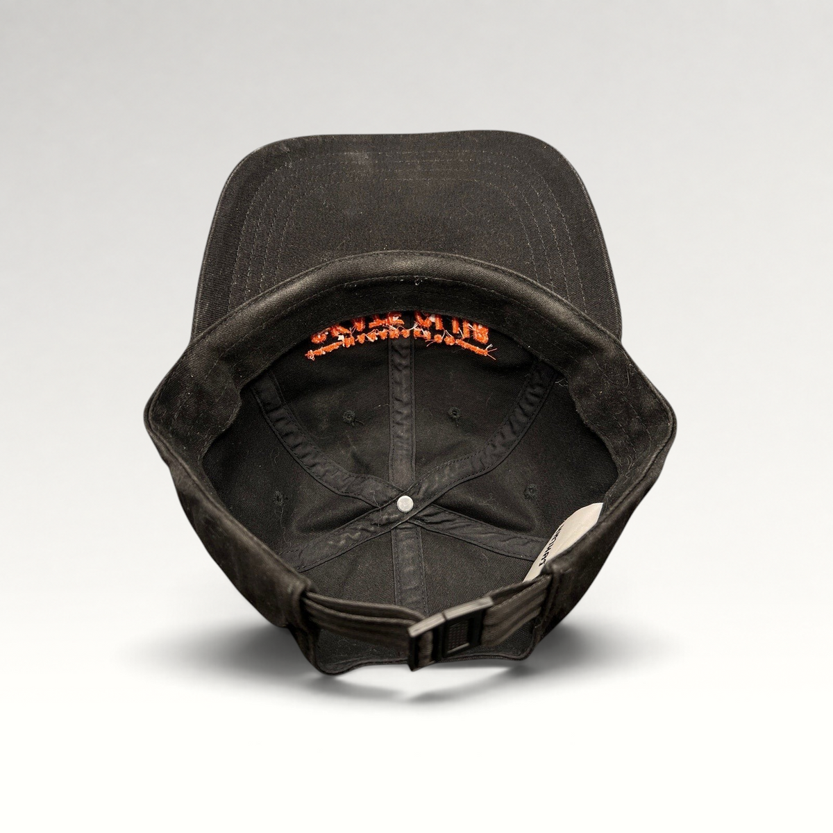 Raree Finds Mahanakhon Skate Club black cotton strapback hat with orange interior embroidery and metal buckle