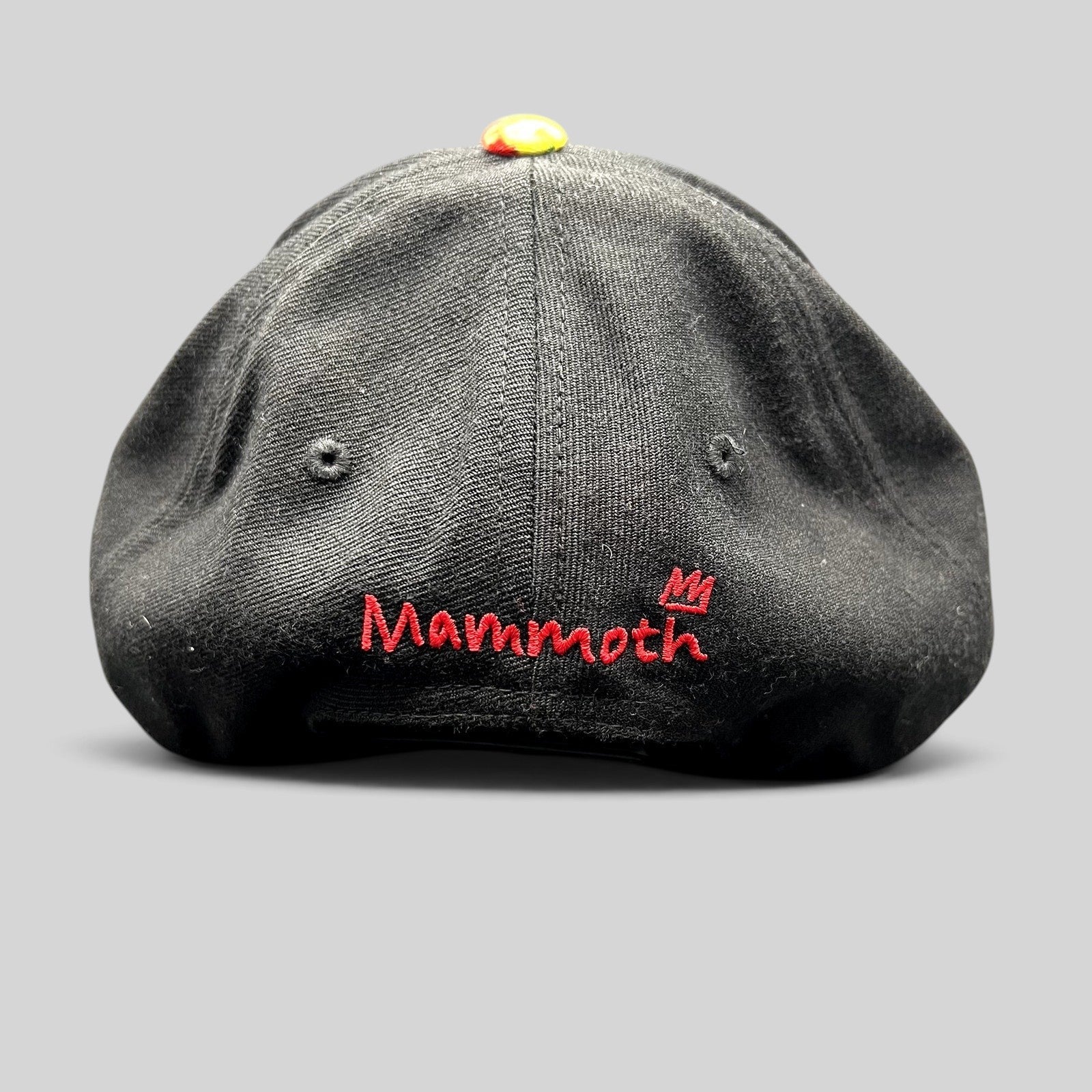 Raree Finds black Mammoth Mountain snapback hat with red embroidered logo on the back and a colorful top button