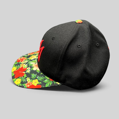 Raree Finds Mammoth Mountain black snapback hat with a vibrant tropical floral print flat brim and red logo