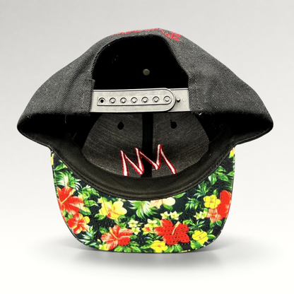 Raree Finds Mammoth Mountain snapback hat featuring a black crown, tropical floral print brim, and adjustable strap.