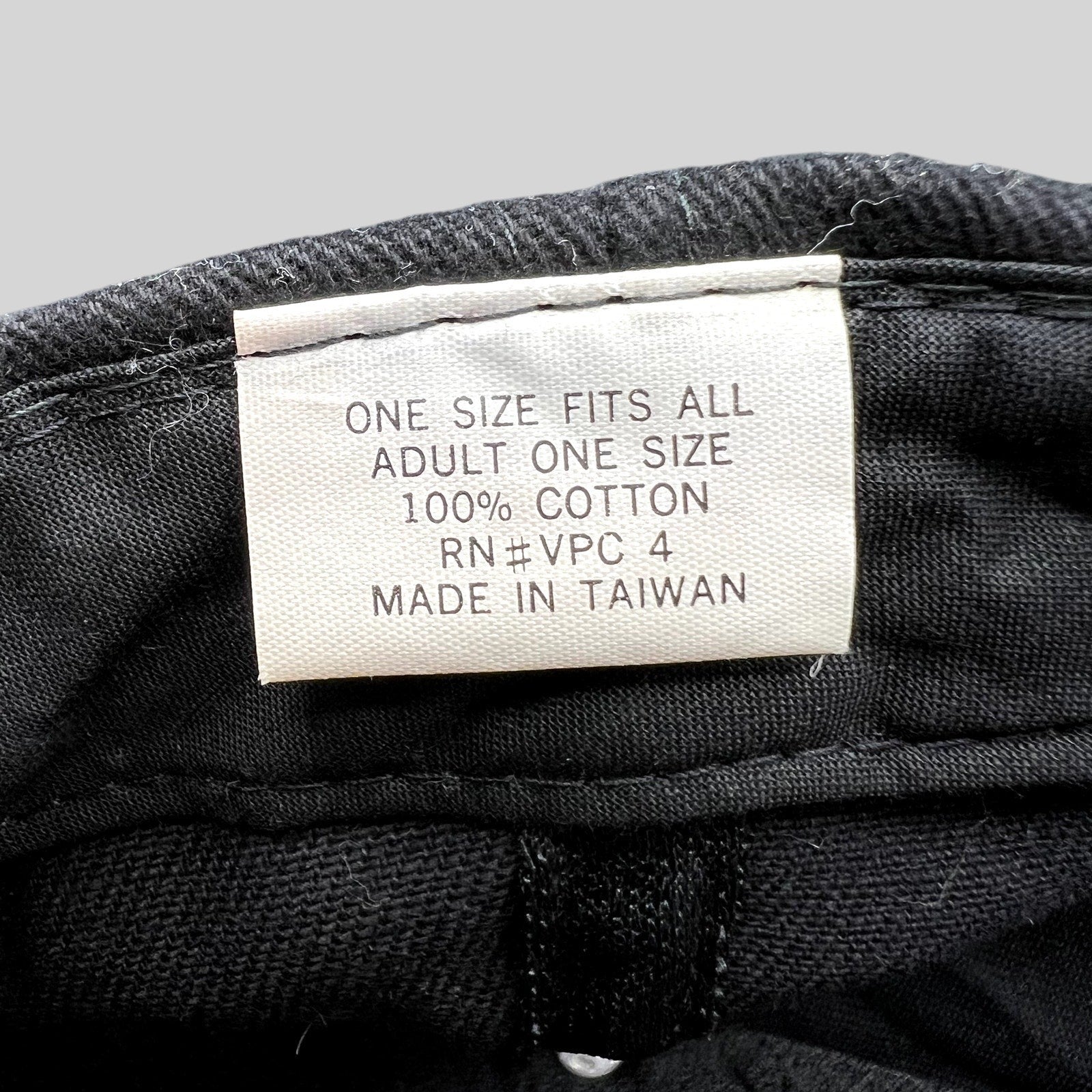 Raree Finds vintage Marlboro hat interior tag showing 100 percent cotton material and made in Taiwan details