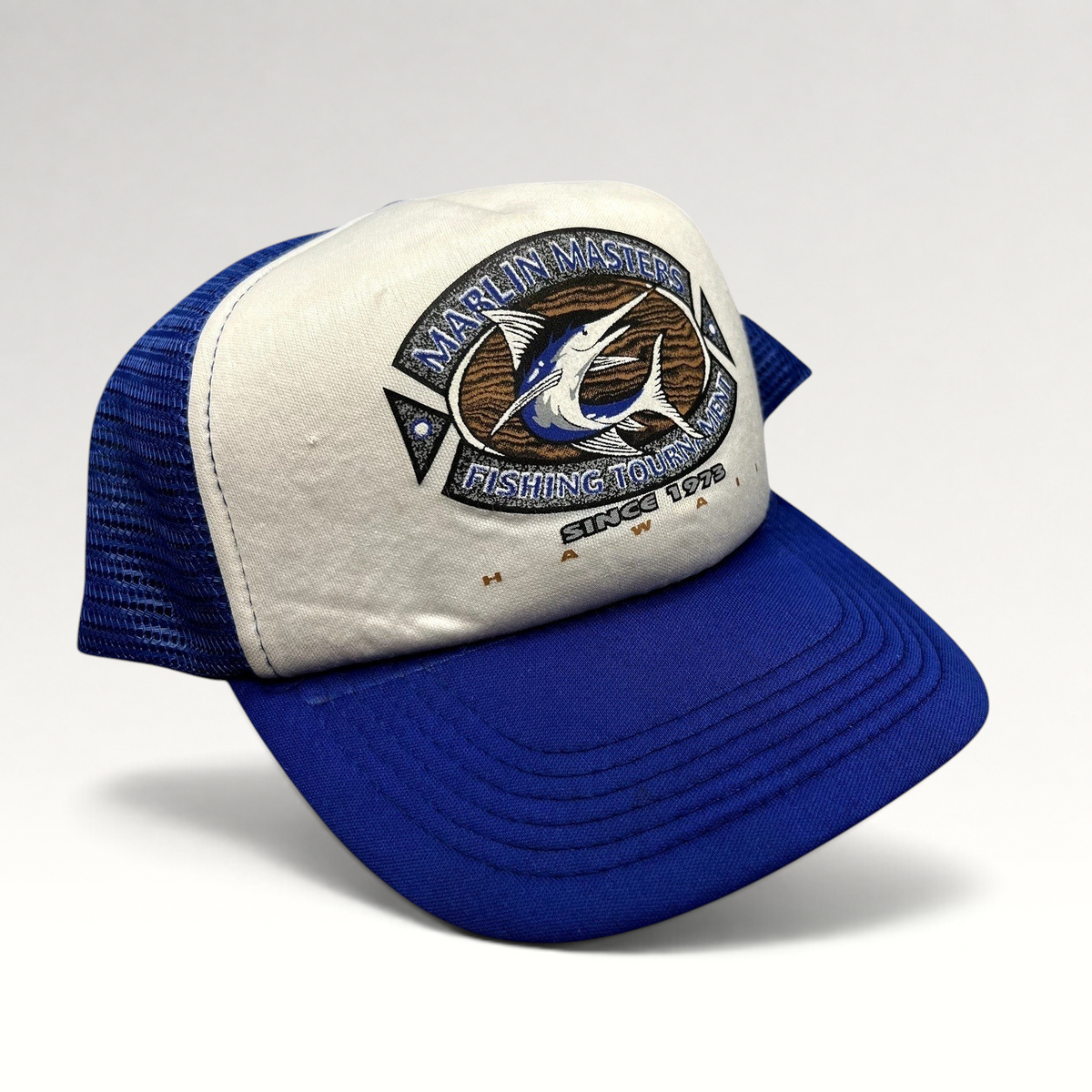 Raree Finds vintage Marlin Masters Hawaii fishing tournament trucker hat with blue mesh back and white foam front.