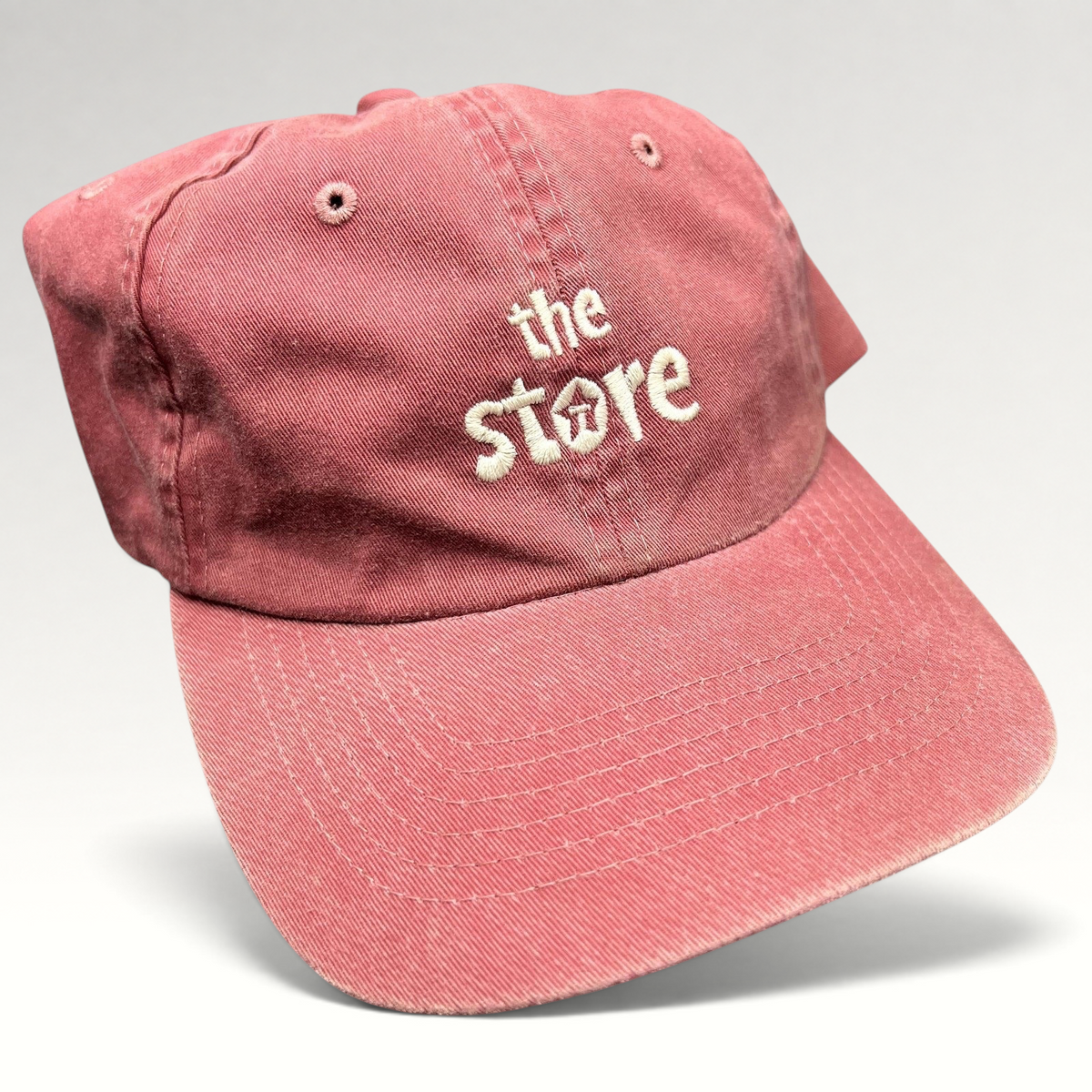 Raree Finds vintage maroon cotton strapback dad cap by Sportsman with white embroidered The Store logo