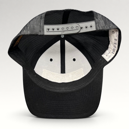 Raree Finds Marvel Damage Control trucker hat showing the interior mesh lining and adjustable black snapback closure.