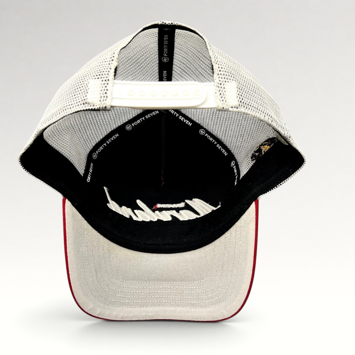 Raree Finds Maryland Terrapins 47 Brand trucker hat featuring a red and white design with a mesh back and snapback.