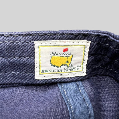 Raree Finds vintage Masters Tournament hat interior label featuring American Needle branding on navy blue fabric