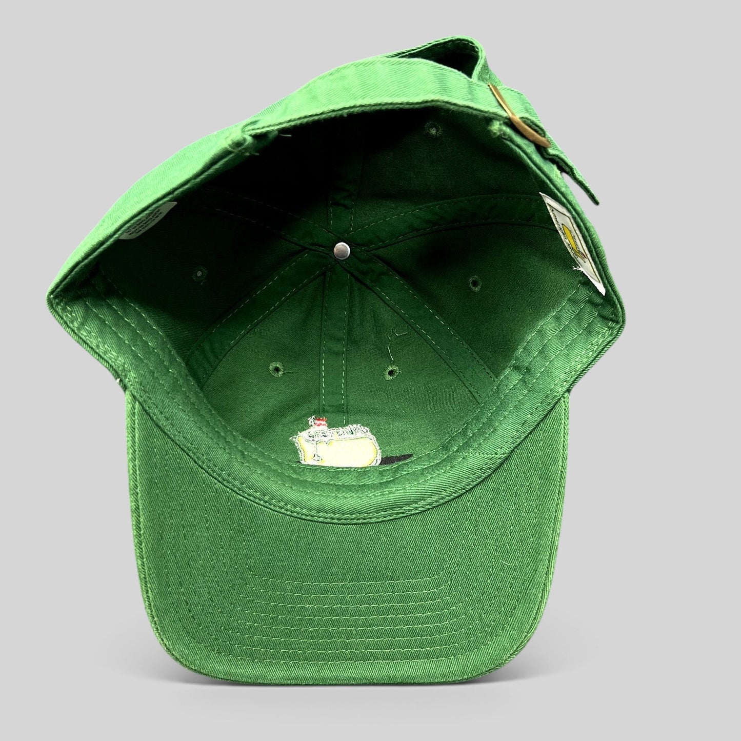 Raree Finds green Masters Tournament cotton strapback hat with interior view of embroidered Augusta National logo