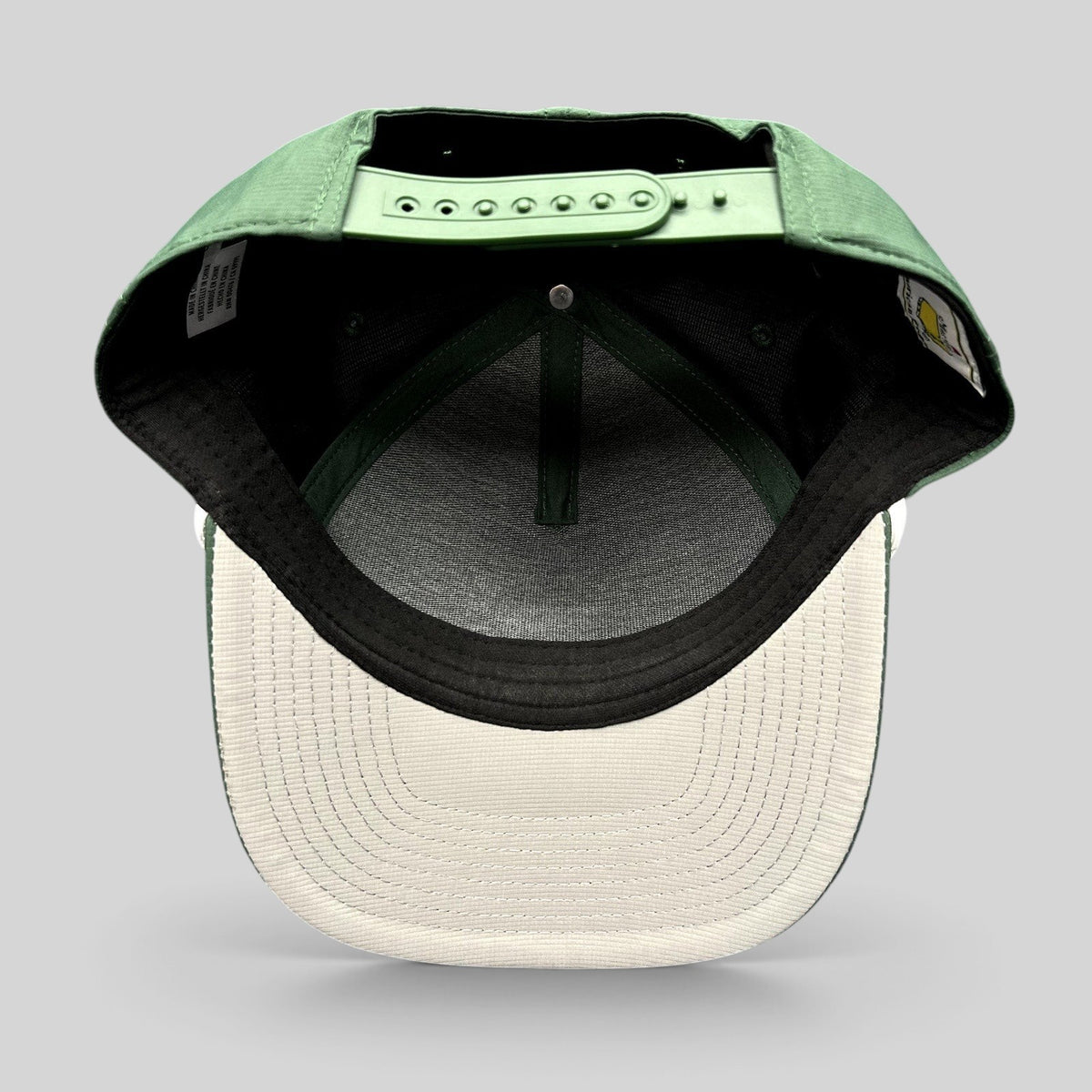 Raree Finds 2024 Masters Tournament green snapback golf hat interior view showing adjustable strap and white brim