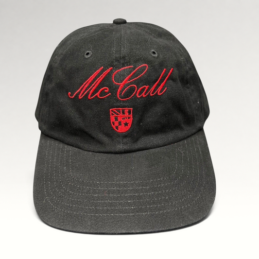 Raree Finds McCall Motor Works black strapback hat with red script embroidery and crest on the front crown