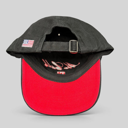 Raree Finds McCall Motor Works black strapback hat with red underbrim and embroidered USA flag on the rear strap