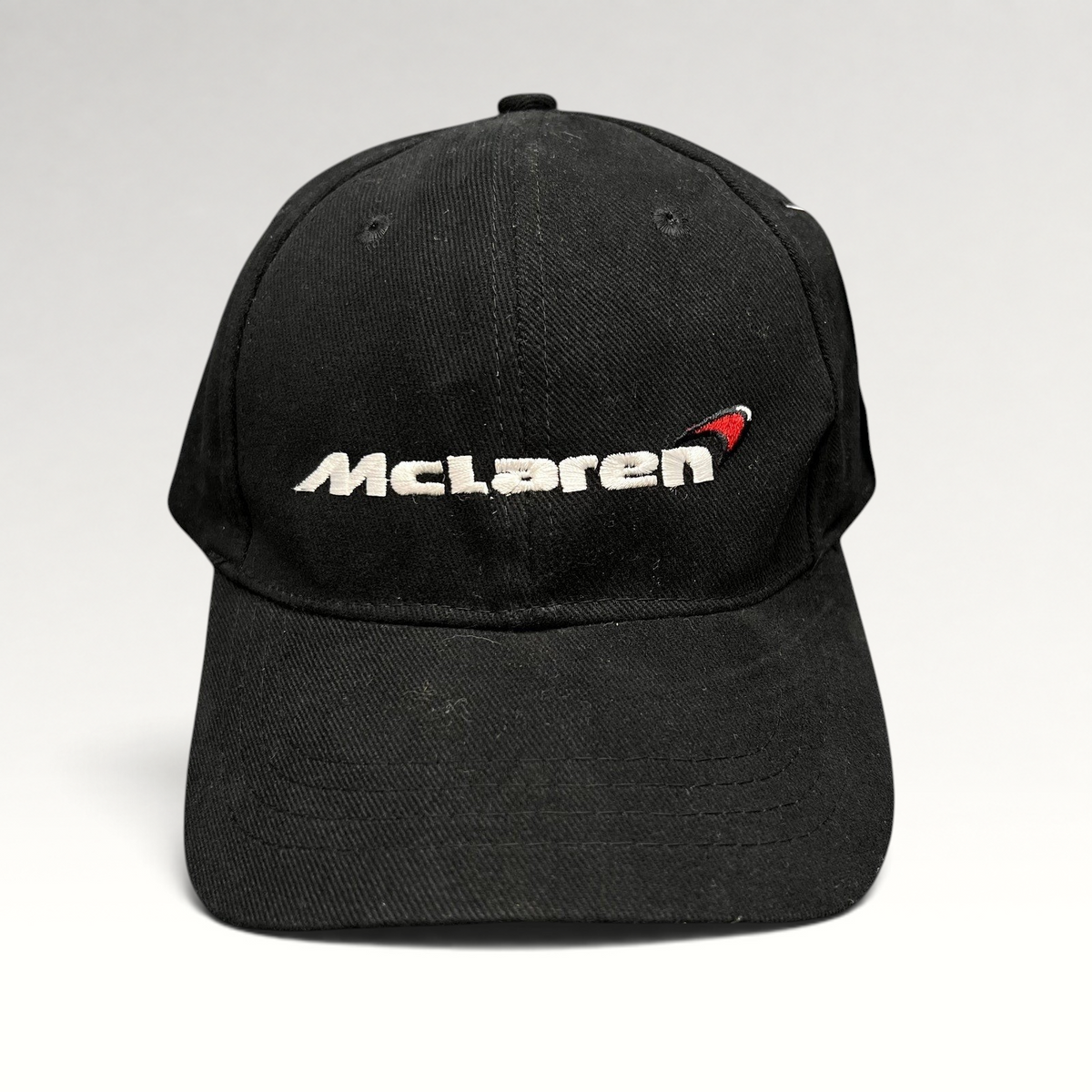 Raree Finds black cotton McLaren strapback hat with white and red embroidered logo on a six-panel low-profile cap.