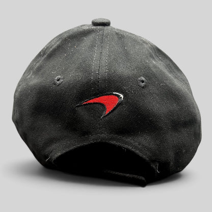 Raree Finds black McLaren cotton strapback hat featuring an embroidered red and white speedmark logo on the back