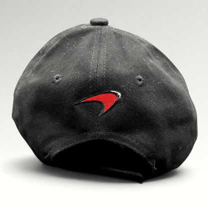 Raree Finds black cotton strapback hat featuring an embroidered red and white McLaren speedmark logo on the back